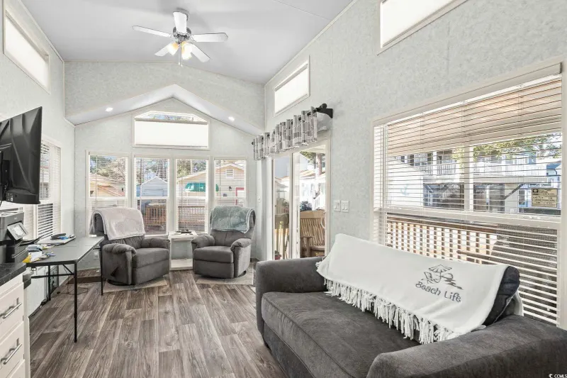 Living area with vaulted ceilings